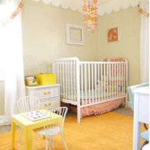 Pink yellow and tan beige baby girl nursery