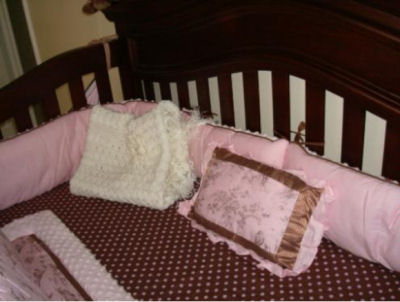 Pink and brown toile baby bedding with a chocolate brown polka dots fitted crib sheet for a baby girl