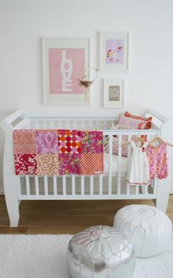 Allegra's modern baby girl nursery decorated in pink white and gray with metallic silver accents