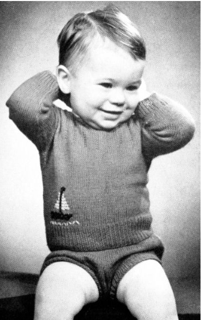 Free baby slipover sweater knitting pattern tutorial for a boy with sailboat embroidery.