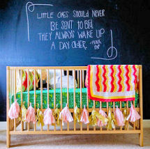 Baby nursery with DIY crafts projects tassels blackboard art wall