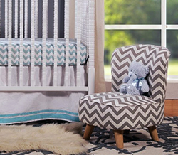 Baby boy chevron nursery ideas in blue gray and white with a recycled upholstered chair.