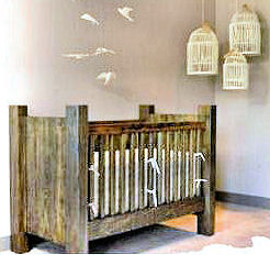 A rustic homemade wooden baby crib for a country nursery room