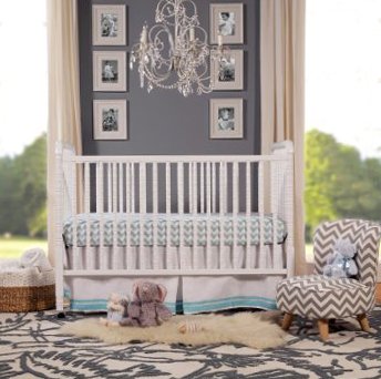 Grey and white neutral baby nursery design ideas featuring chevron and zebra stripes.