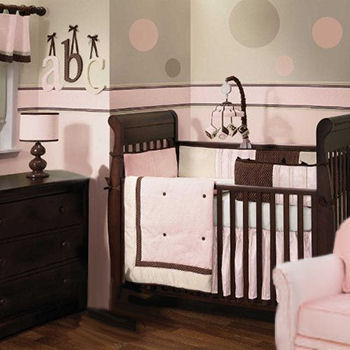 Sophisticated pink and chocolate brown crib bedding set for a baby girl nursery