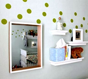 Gender neutral nursery room decorated with green vinyl polka dots wall decals for a baby boy