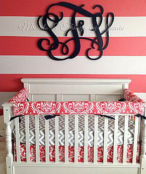 Baby Girl nursery room with hot pink watermelon stripes on the wall and chevron baby crib bedding set